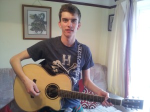 Pete learning to play the Guitar